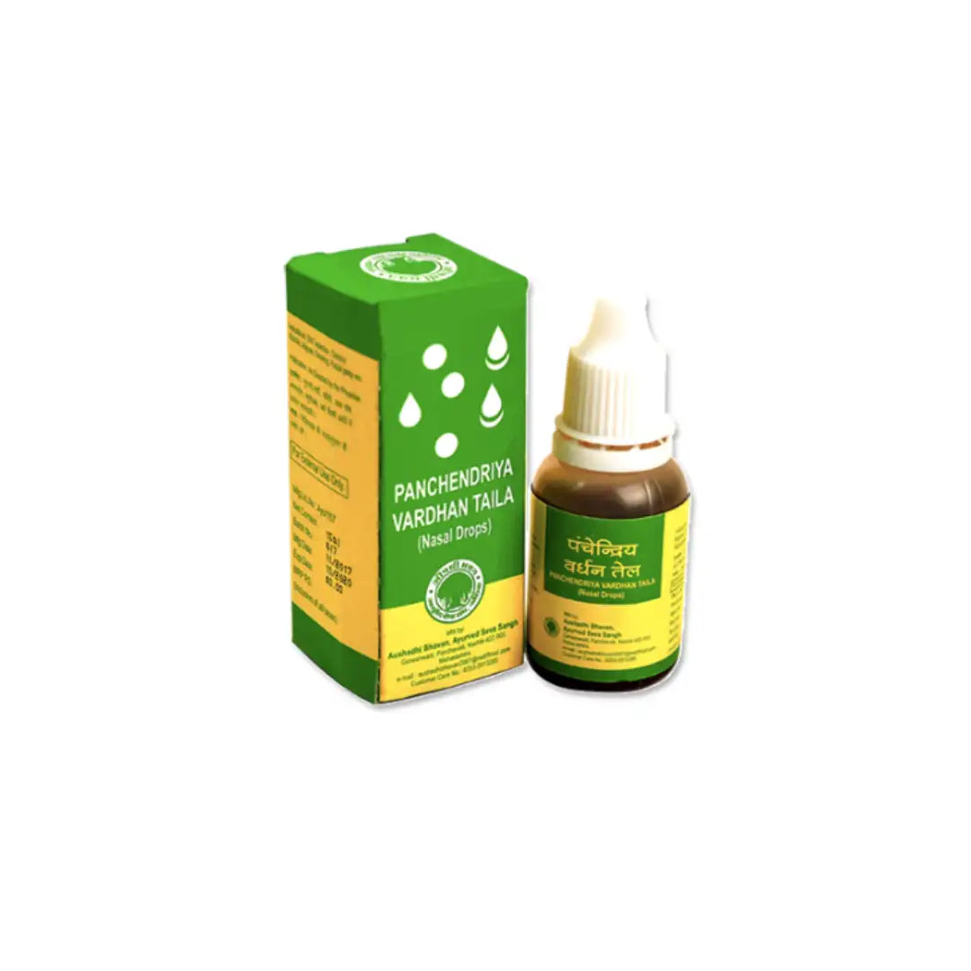 Green and yellow cardboard box with white droplet icons next to a small brown glass bottle with a white cap, labeled ’panchendriya vardhan taila (nasal drops)’ in english and hindi.